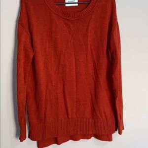 red/brown sweater